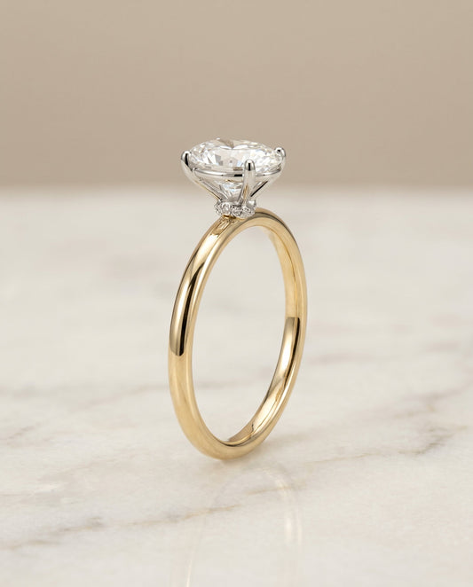 Cyndi Select Curved Hidden Halo Solitaire Oval in 14K Yellow Gold – view 1