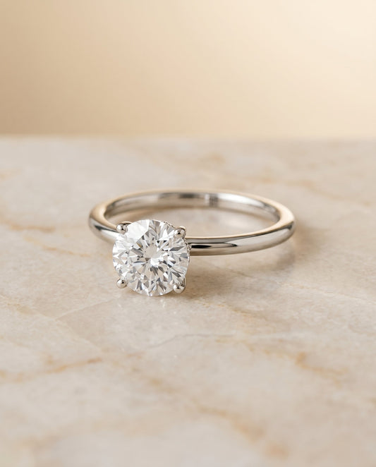 Cyndi Select Curved Hidden Halo Solitaire in Platinum – view 1