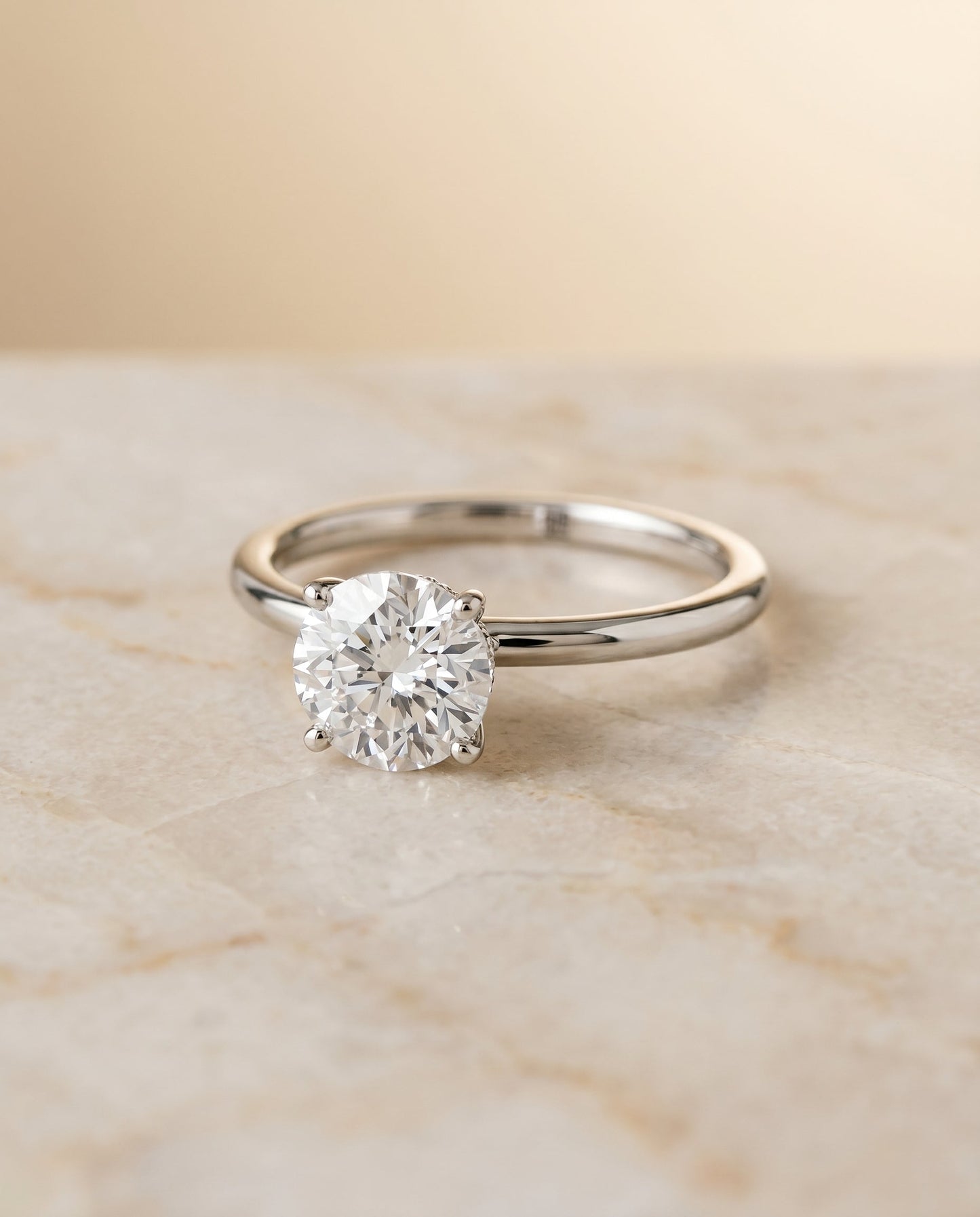 The Cyndi Hidden Halo Solitaire Engagement Ring Setting for Round Diamonds in 18K White Gold | RockHer