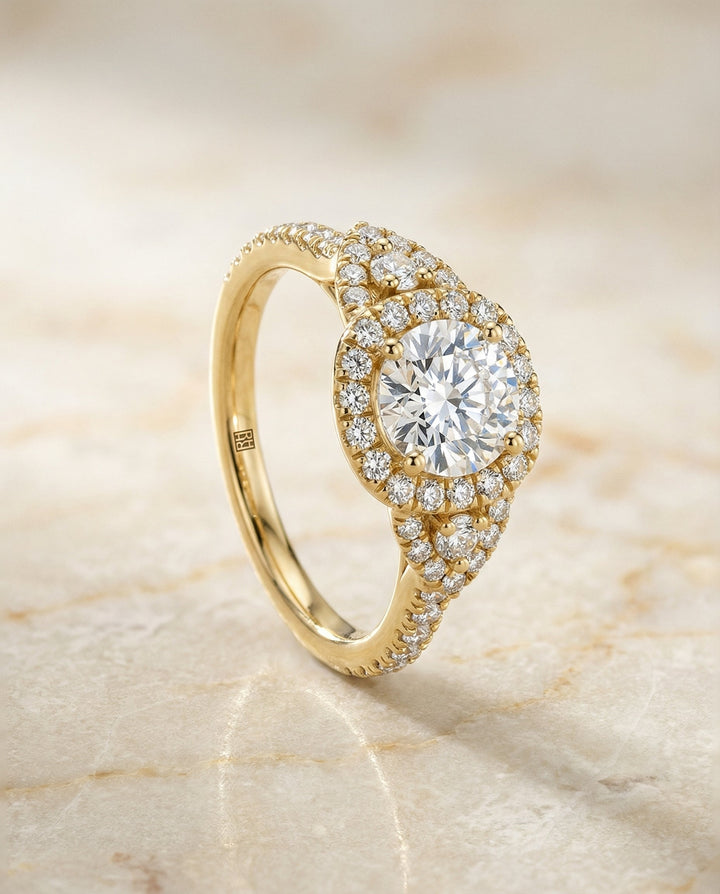 Round Brilliant, Delicate Three Stone Halo, in 18K Yellow Gold, pave setting – front view | RockHer