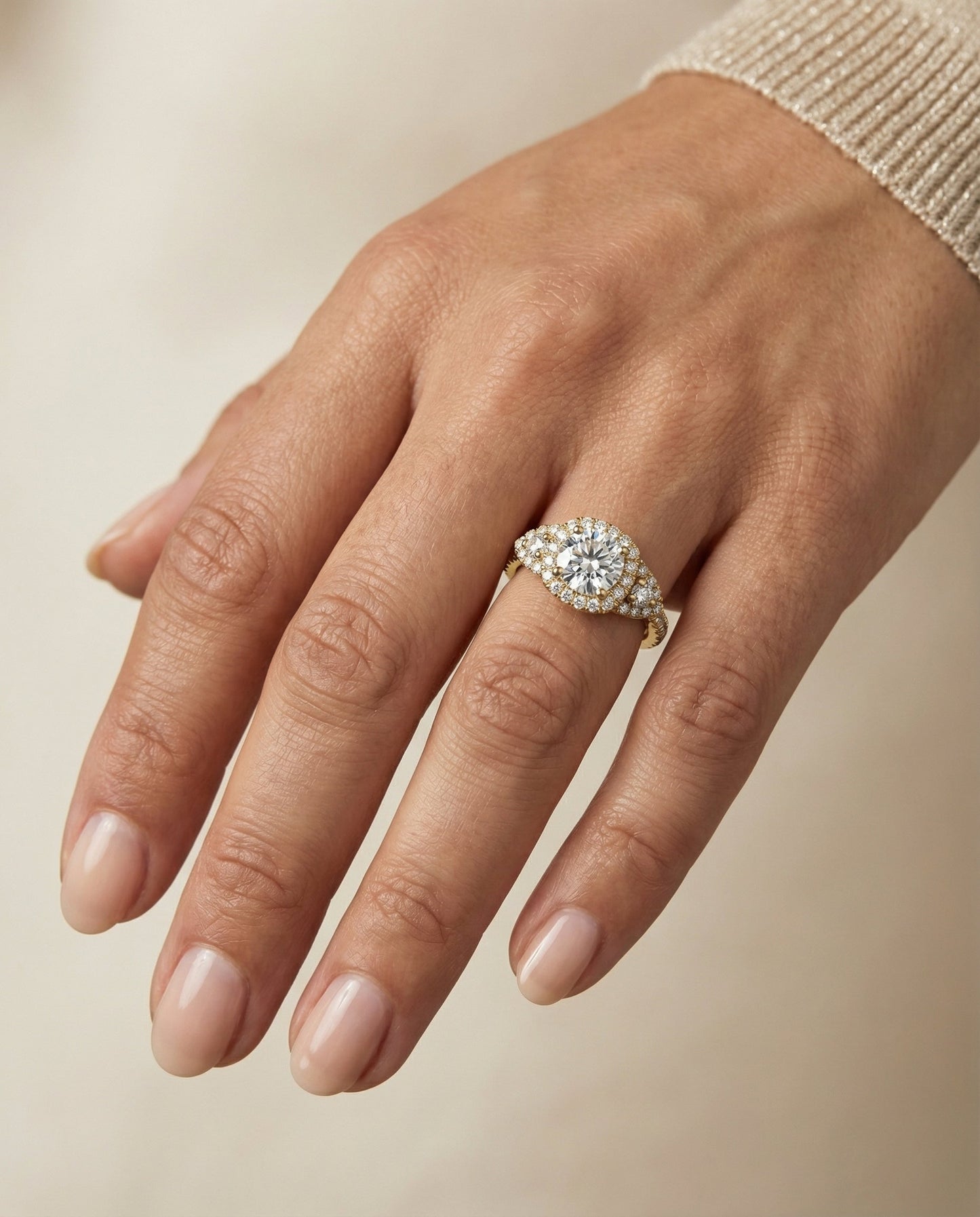 Round Brilliant, Delicate Three Stone Halo, in 18K Yellow Gold, pave setting – lifestyle shot | RockHer
