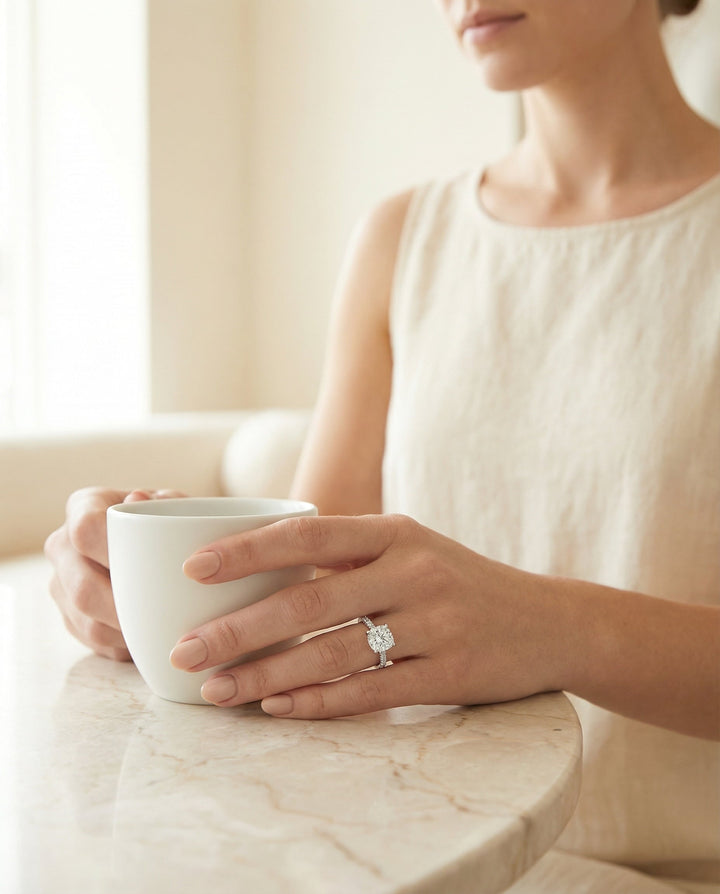 Diamond Encrusted Claw Triple Pavé Cushion, in Platinum – lifestyle shot | RockHer