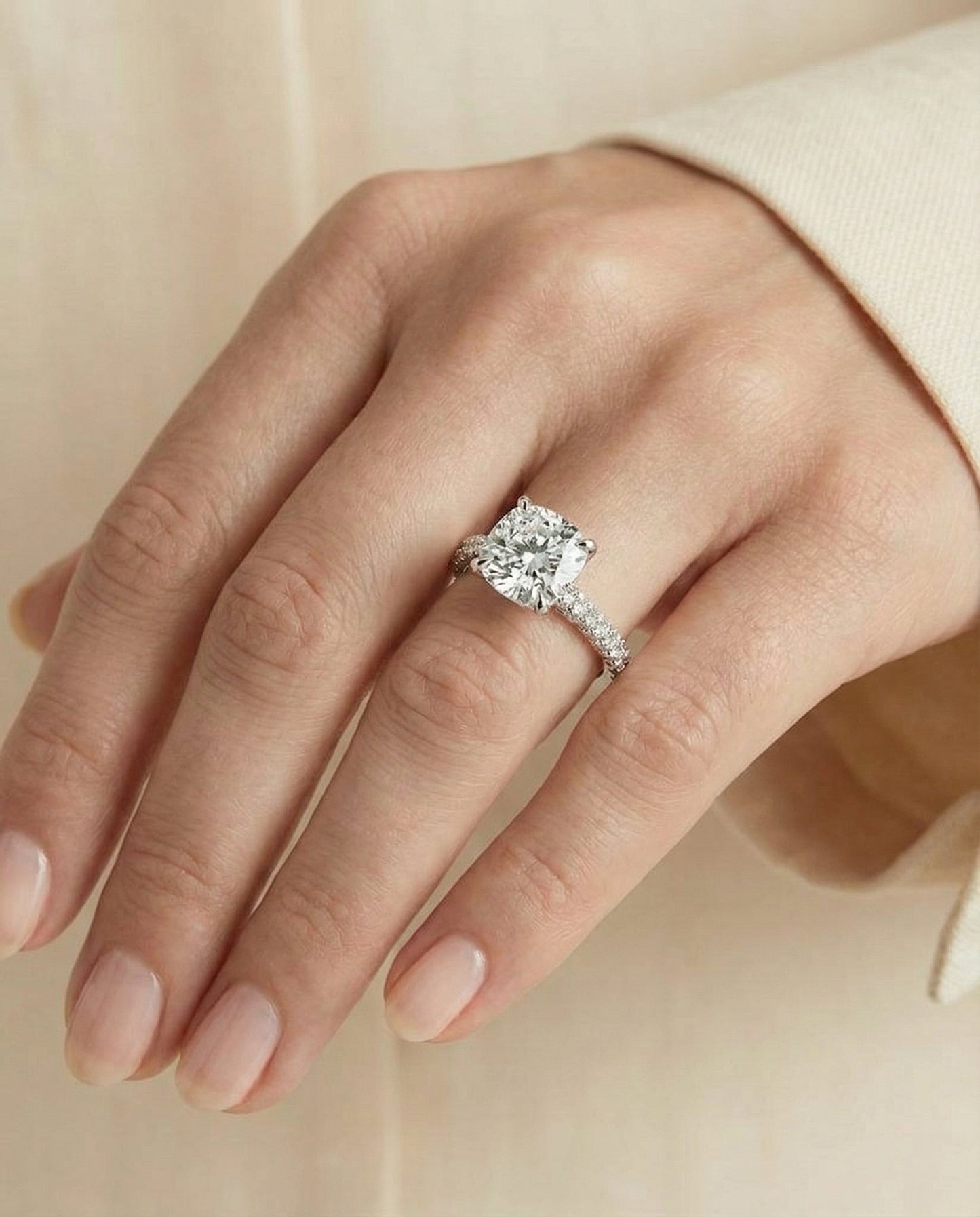 Diamond Encrusted Claw Triple Pavé Cushion, in 18K White Gold – lifestyle shot | RockHer