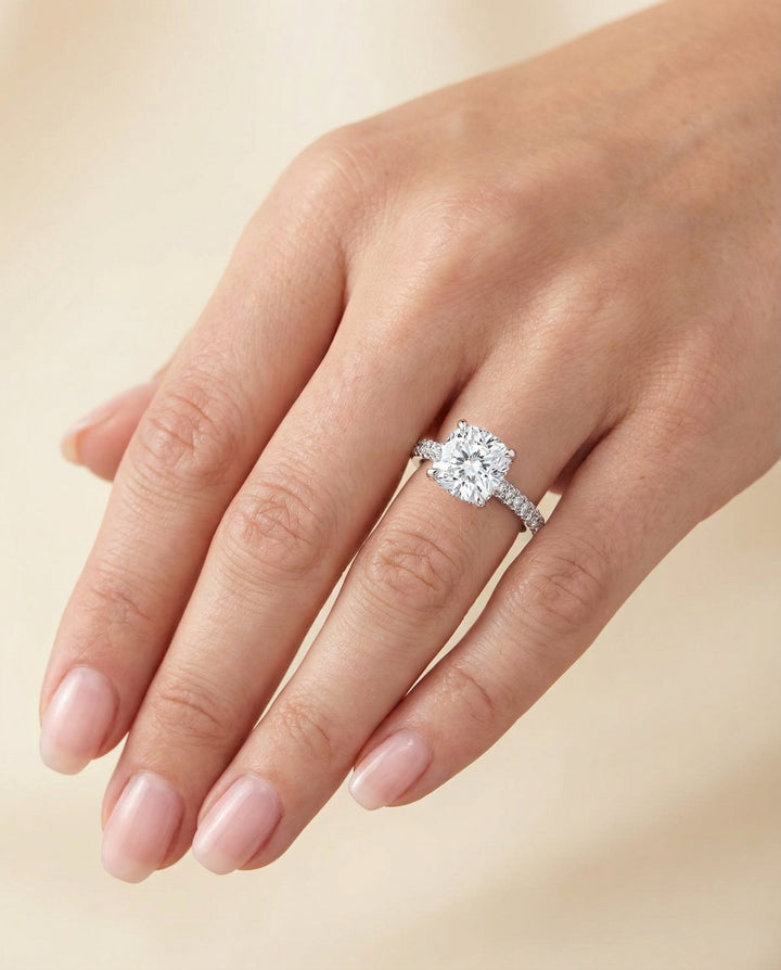 Diamond Encrusted Claw Triple Pavé Cushion, in Platinum – lifestyle shot | RockHer