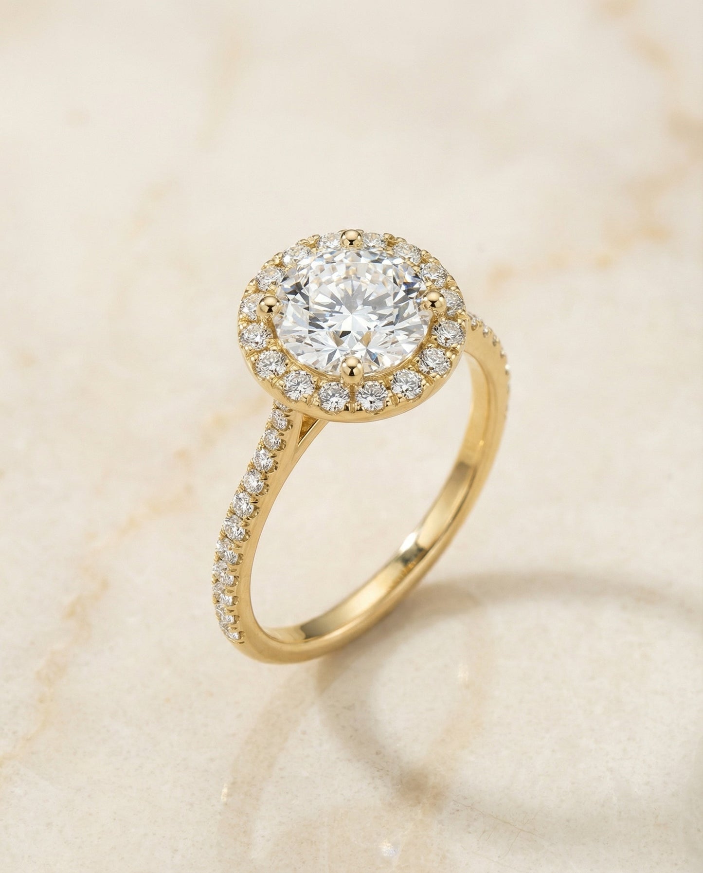Round Brilliant, Diamond Pavé Halo, in 18K Yellow Gold, pave setting – angled view | RockHer