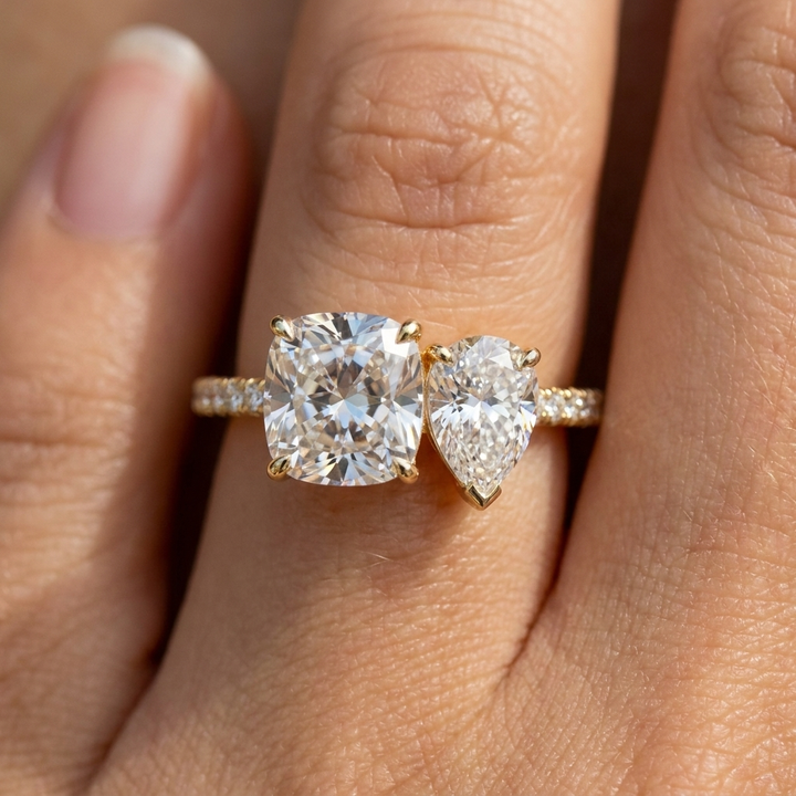 The Diana — Toi et Moi Cushion & Pear Pavé Band - Macro close-up on finger