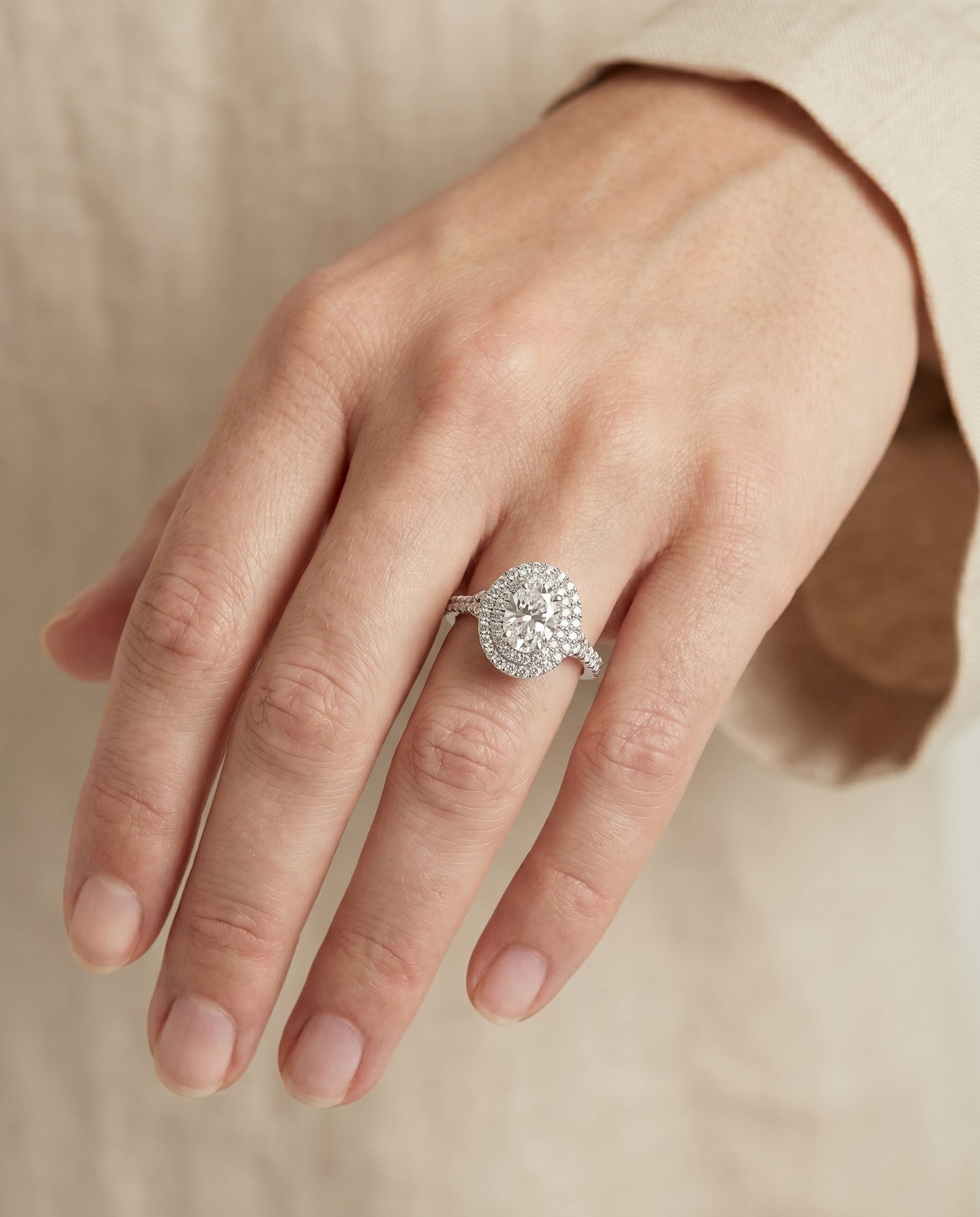 Double Scalloped Pavé Halo Oval, in Platinum, pave setting – lifestyle shot | RockHer