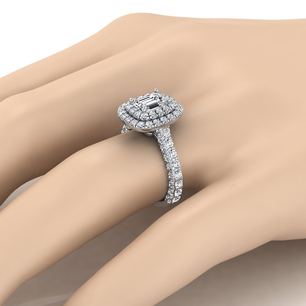 แหวนหมั้นทองคำขาว 14K ประดับเพชรทรงสี่เหลี่ยมมรกต หนักรวม 2 กะรัต ดีไซน์โดดเด่นและหรูหราพร้อมวงแหวนฝรั่งเศสแบบปาเว่คู่