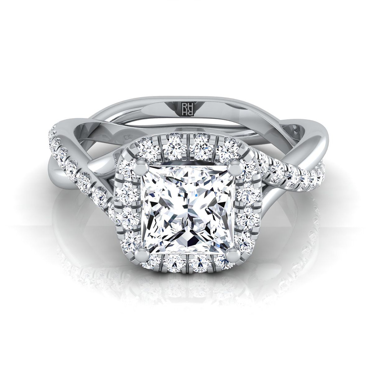แหวนหมั้นเพชรทรงเจ้าหญิงแพลทินัม ตกแต่งแบบบิดและขอบหยัก พร้อมฮาโลกลางแบบปาเว่ - 3/8ctw