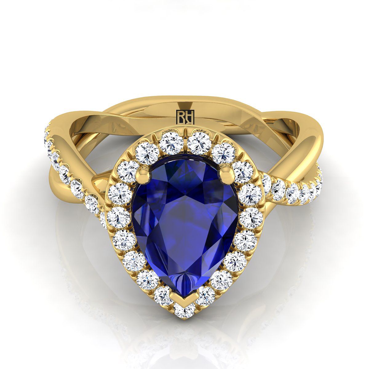 แหวนหมั้นทองคำ 14K สีเหลือง รูปทรงลูกแพร์ ประดับด้วยไพลินตรงกลาง ล้อมด้วยเพชรในดีไซน์เถาวัลย์บิด - 1/2 กะรัตรวม