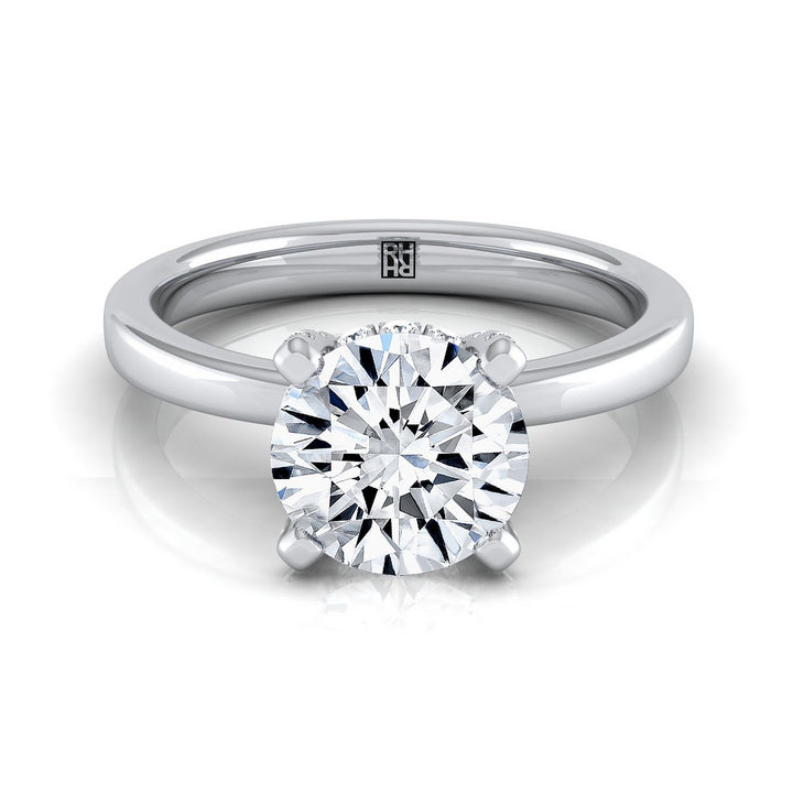 Round Brilliant, Secret Halo Adorned Prong Solitaire, in 18K White Gold – view 8 | RockHer