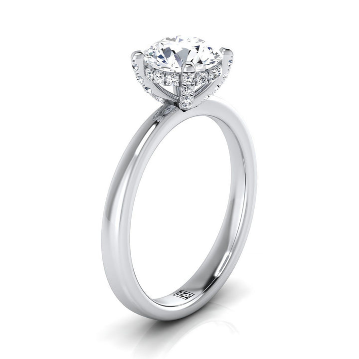 Platinum Round Brilliant Diamond Adorned Claws and Secret Halo Solitaire Engagement Ring -1/10ctw
