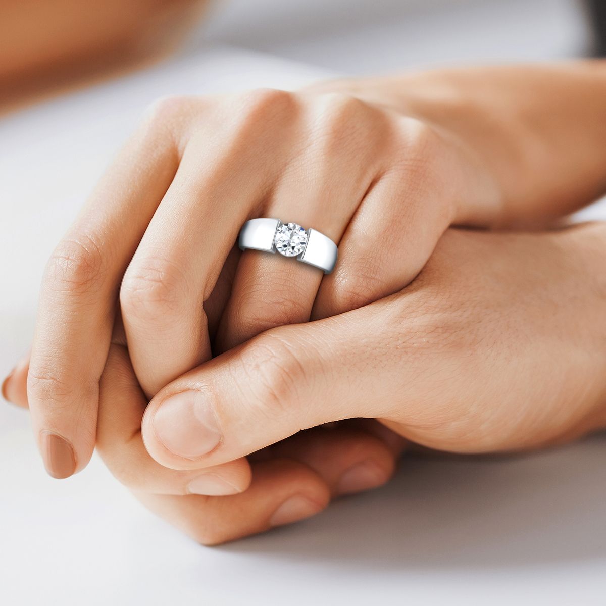 Round Brilliant, Wide High Polish Tension Channel Solitaire, in 18K White Gold – detail view | RockHer
