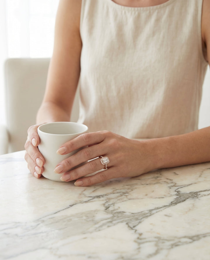 European Cut, East West Horizontal Halo Emerald, in 14K Rose Gold – lifestyle shot | RockHer
