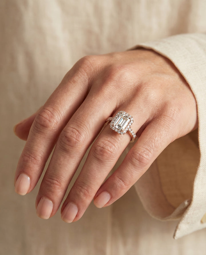 European Cut, East West Horizontal Halo Emerald, in 14K Rose Gold – lifestyle shot | RockHer