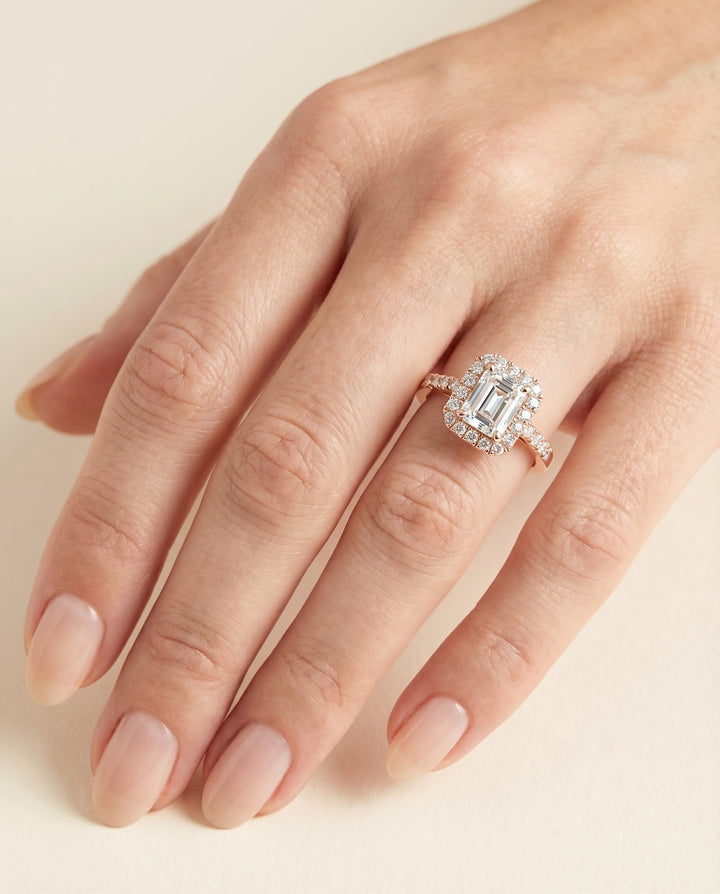 European Cut, East West Horizontal Halo Emerald, in 14K Rose Gold – lifestyle shot | RockHer