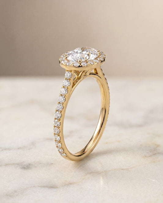 The Christina East West Pavé Halo Engagement Ring Setting for Oval Diamonds in 18K Yellow Gold | RockHer