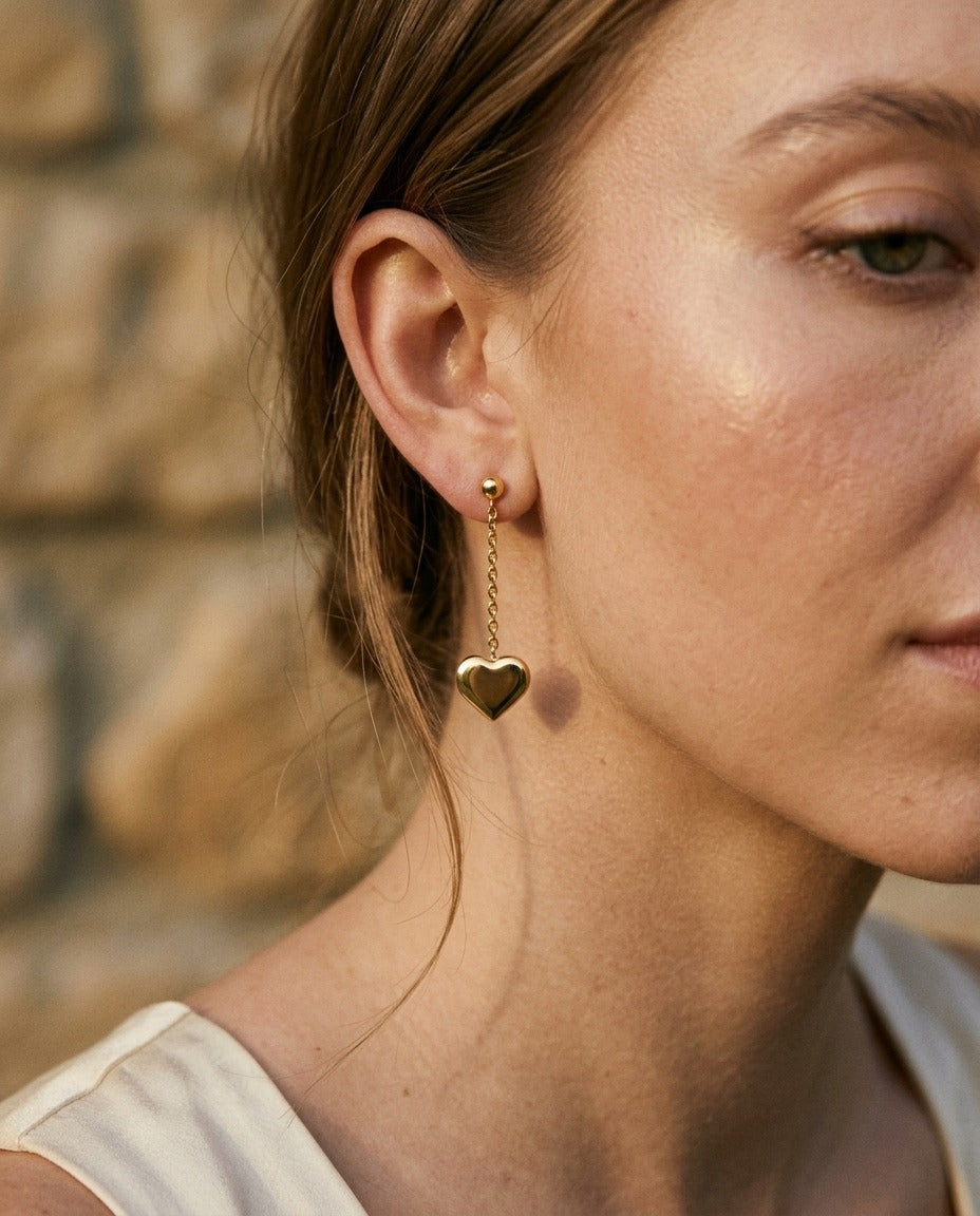 14K Yellow Gold Heart Dangle Stud Earrings – angled view | RockHer