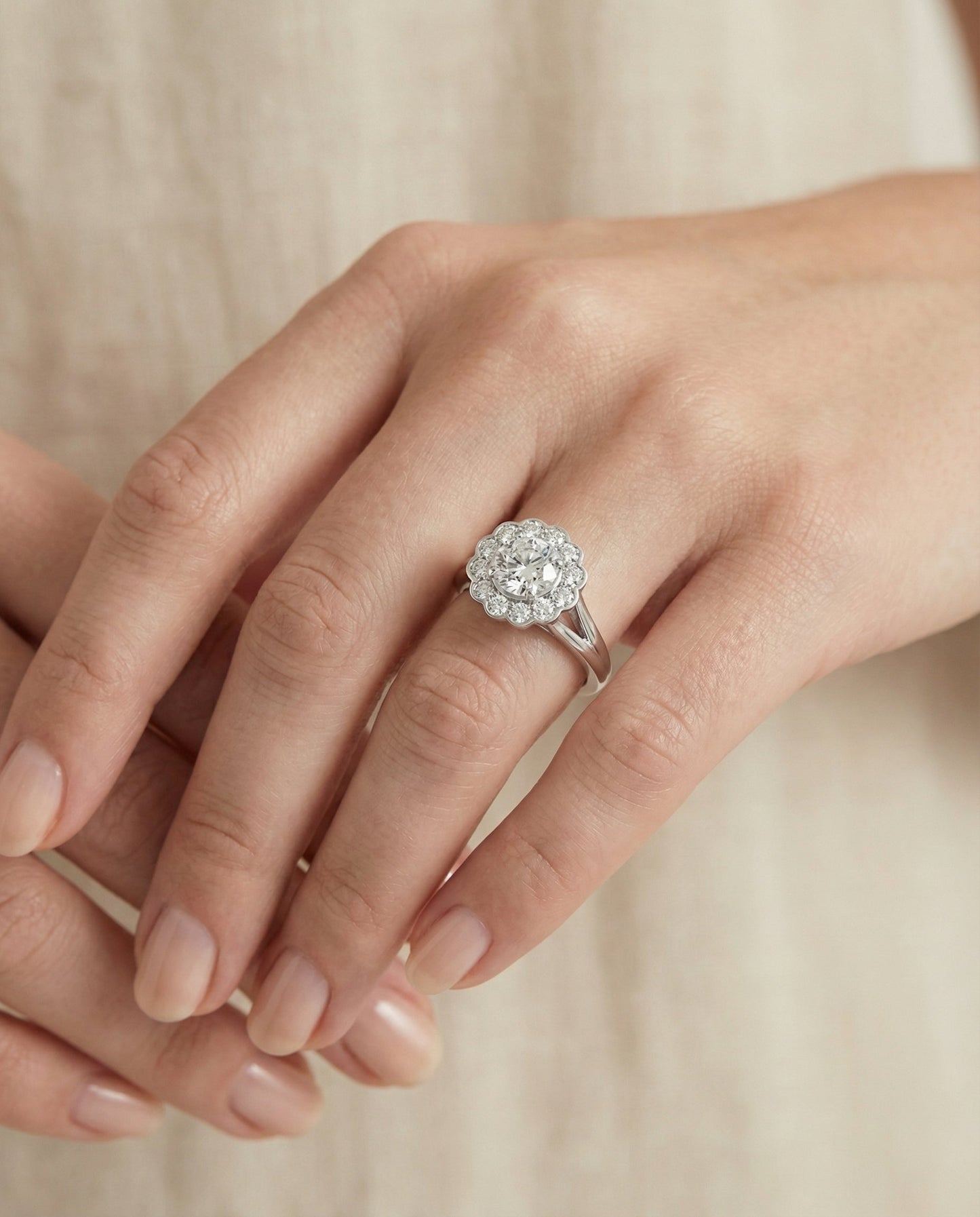Round Brilliant, Floral Split Shank Halo, in 18K White Gold, prong setting – lifestyle shot | RockHer