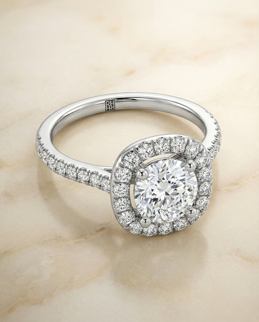 French Pavé Halo Frame Cushion, in Platinum, pave setting – angled view | RockHer