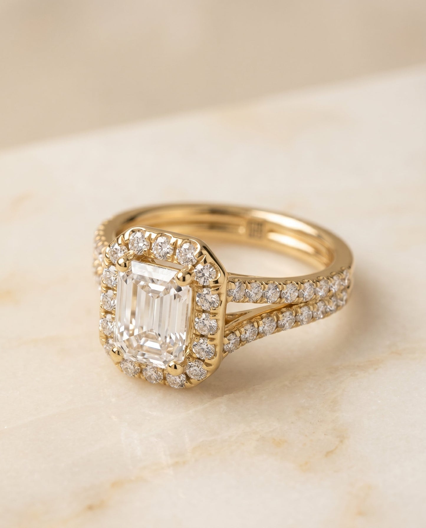 European Cut, French Pavé Split Shank Halo Emerald, in 18K Yellow Gold, pave setting – angled view | RockHer