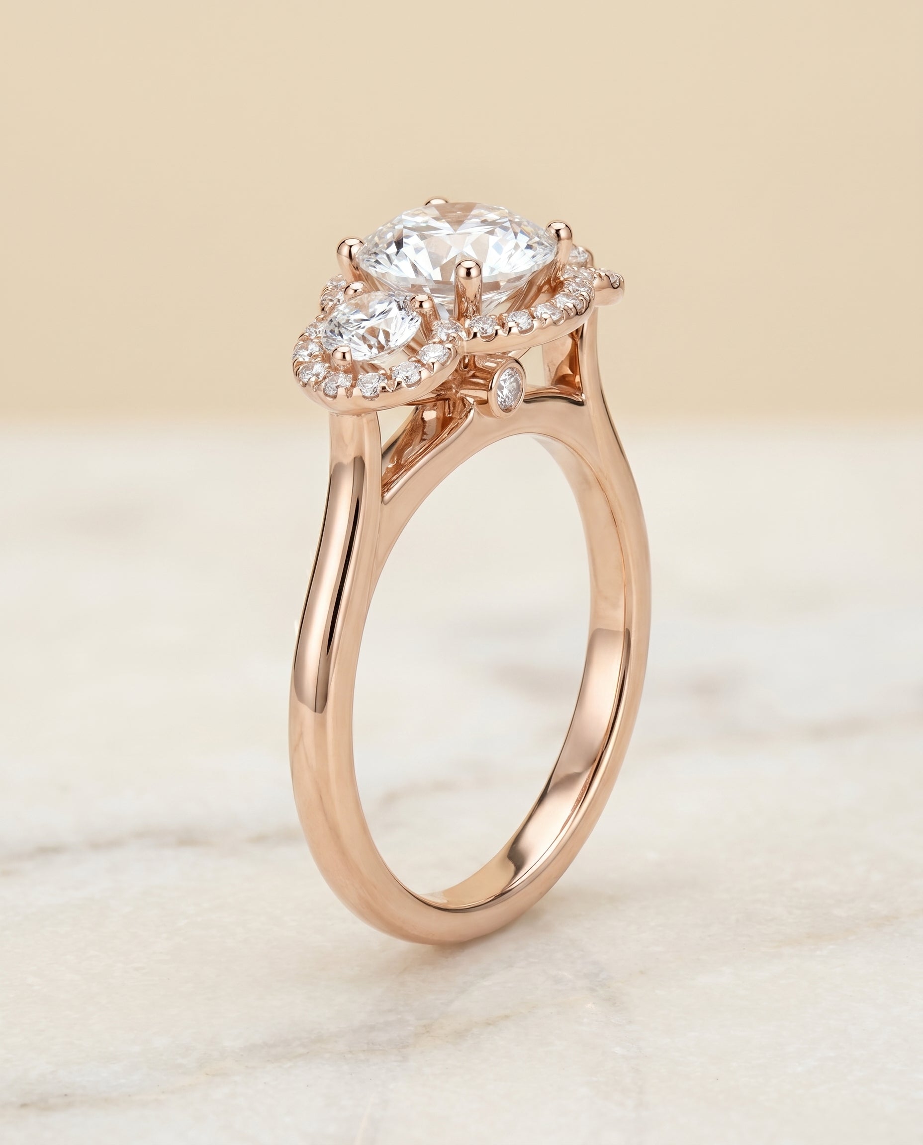 Anna Select French Pave Three Stone Solitaire in 14K Rose Gold – view 1