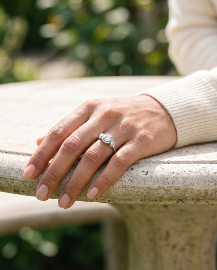 Round Brilliant, French Pavé Three Stone, in Platinum, prong setting – lifestyle shot | RockHer