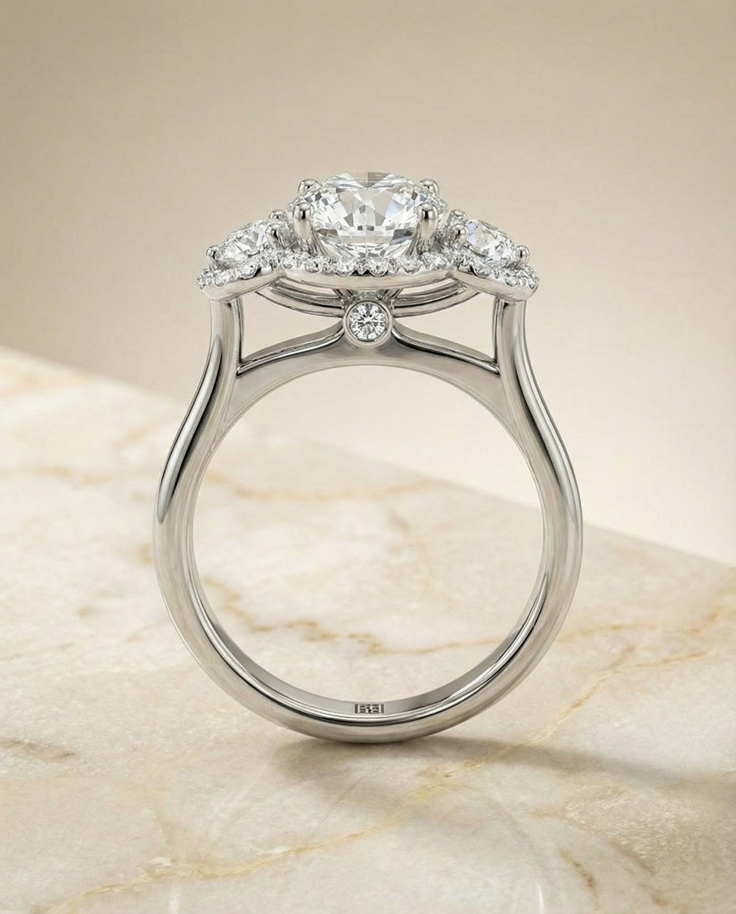 Round Brilliant, French Pavé Three Stone, in Platinum, prong setting – side profile | RockHer