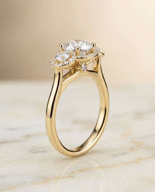 Round Brilliant, French Pavé Three Stone, in 18K Yellow Gold, prong setting – front view | RockHer