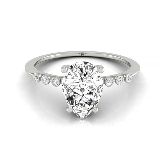 Plat Pear Engagement Ring With 6 Bezel Set Round Diamonds On Shank