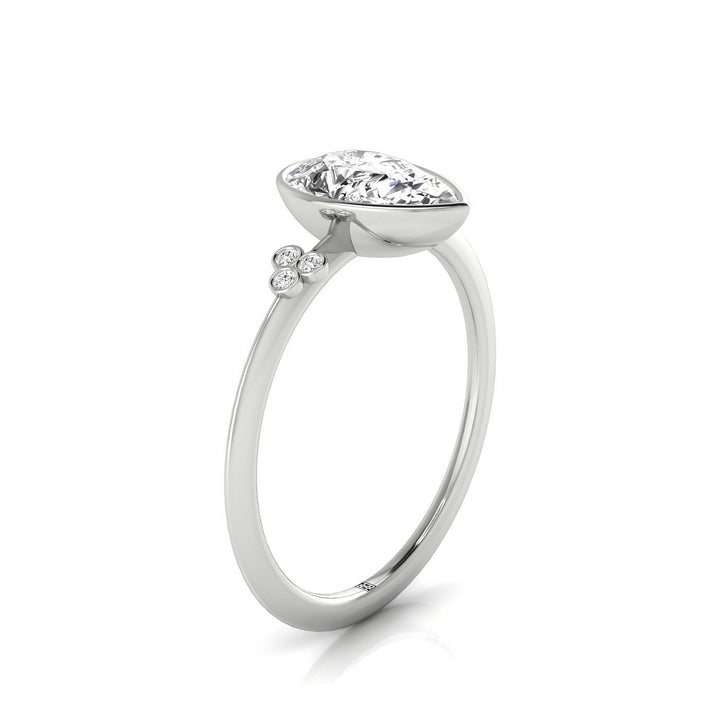 18kw Bezel Set Pear Engagement Ring With 6 Clover Bezel Set Round Diamonds On Shank