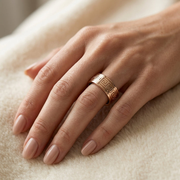 Greek Key Engraved Gold Cover for Oura Ring, in 14K Rose Gold – lifestyle shot | RockHer