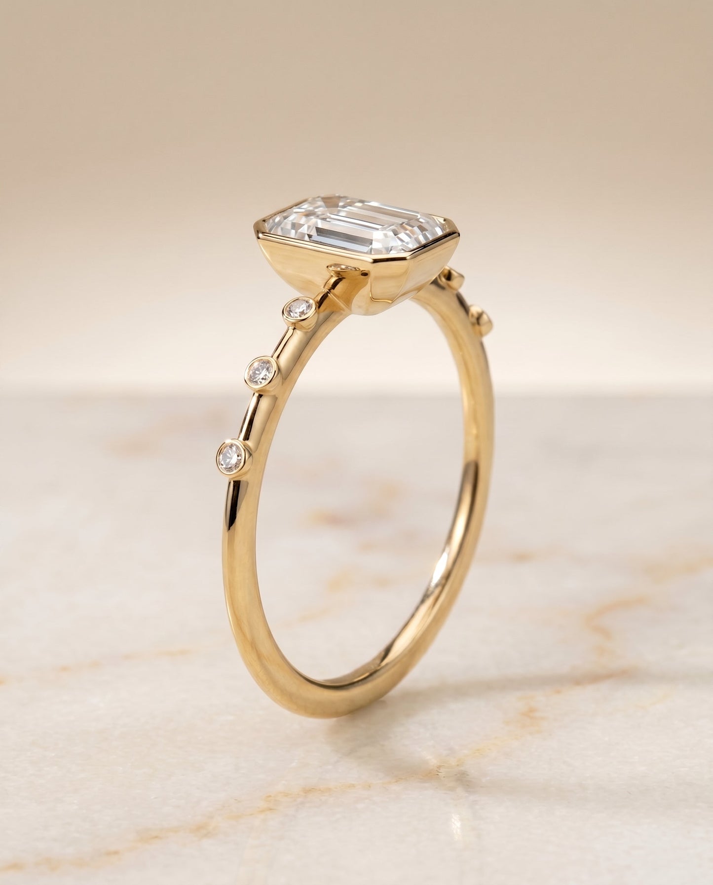 The Brandi Hidden Halo Engagement Ring Setting for Emerald Cut Diamonds in 18K Yellow Gold | RockHer