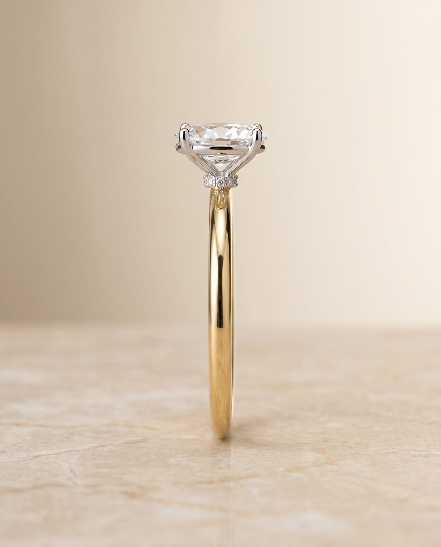 The Joni Hidden Halo Solitaire Engagement Ring Setting for Oval Diamonds in 18K Yellow Gold