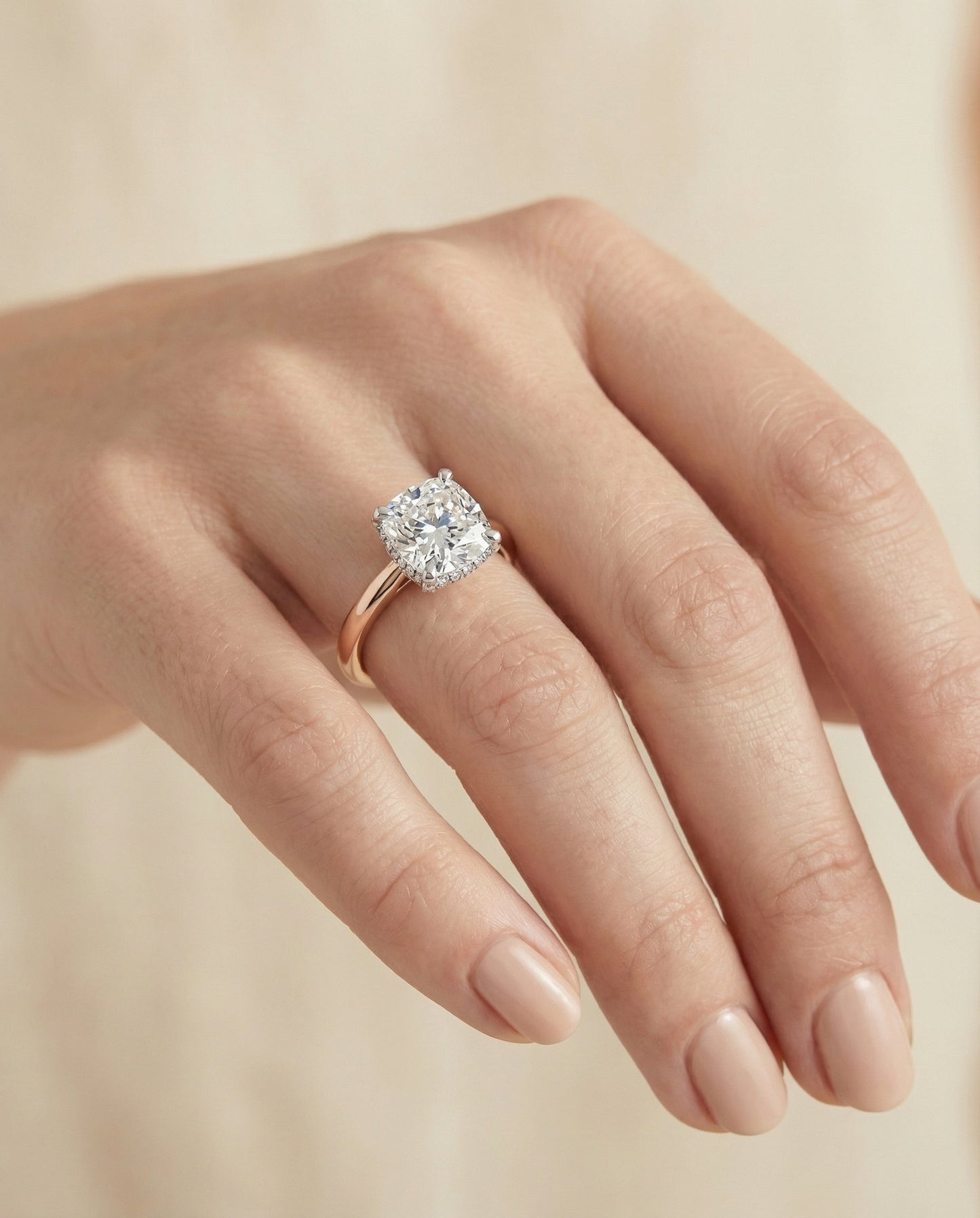 Hidden Pavé Basket Crown Solitaire Cushion, in 14K Rose Gold, prong setting – lifestyle shot | RockHer