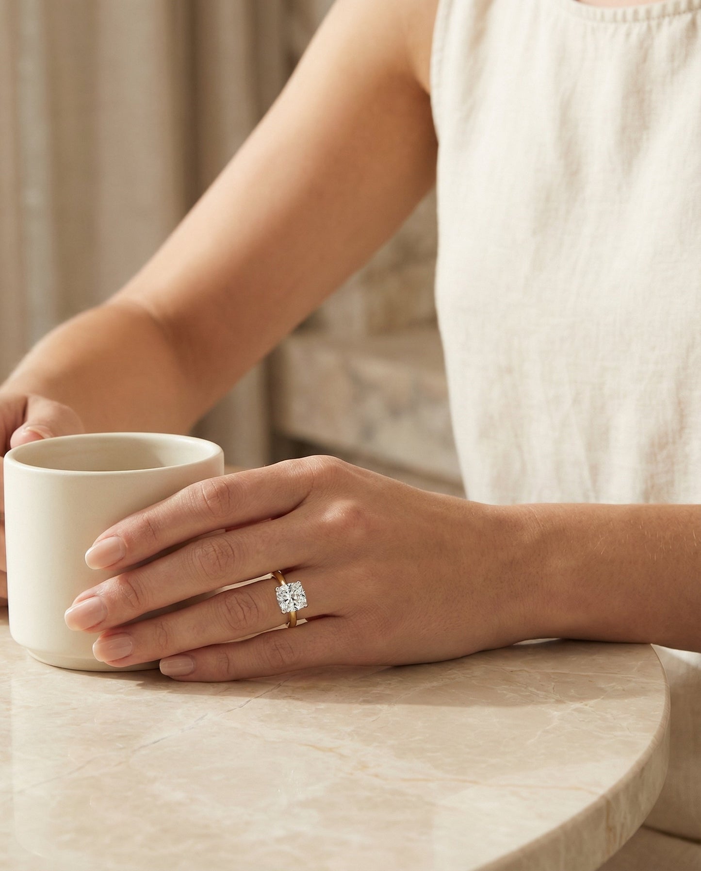 Hidden Pavé Basket Crown Solitaire Cushion, in 18K Yellow Gold – lifestyle shot | RockHer