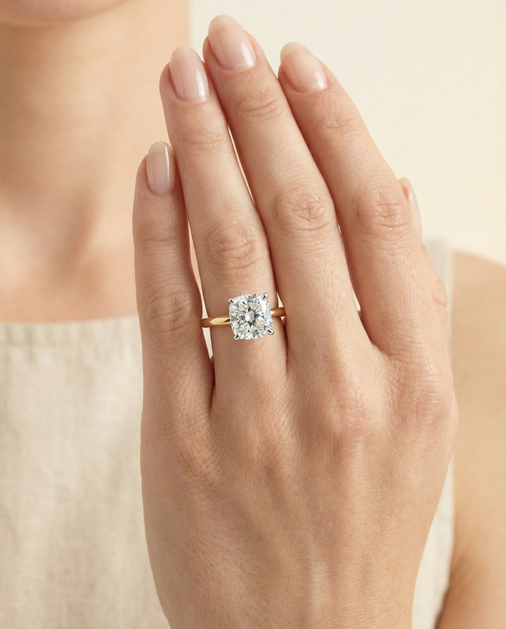 Hidden Pavé Basket Crown Solitaire Cushion, in 18K Yellow Gold – lifestyle shot | RockHer