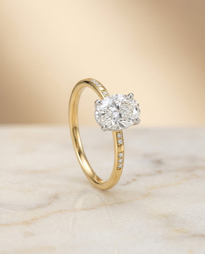 The Wanda Hidden Halo Solitaire Engagement Ring Setting for Oval Diamonds in 18K Yellow Gold