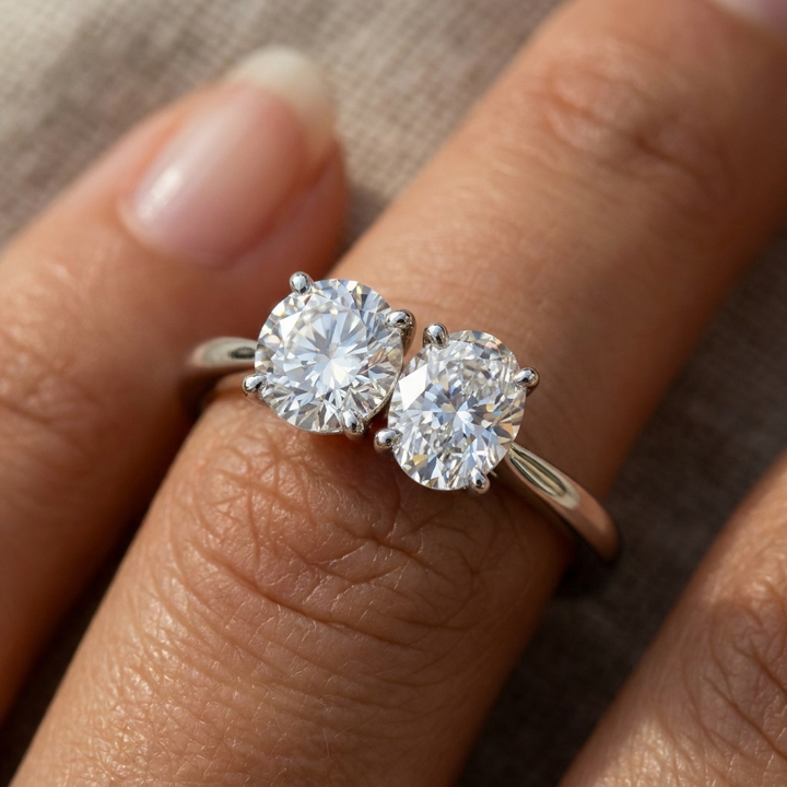14K White Gold Jackie Select Toi et Moi Round & Oval Knife Edge Band Lab Diamond Engagement Ring - Macro close-up on finger
