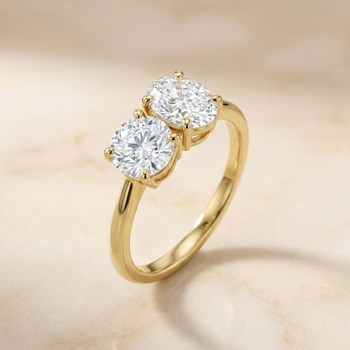 14K Yellow Gold Jackie Select Toi et Moi Round & Oval Knife Edge Band Lab Diamond Engagement Ring - Alt angle on warm marble