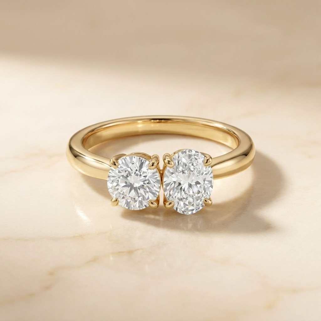 14K Yellow Gold Jackie Select Toi et Moi Round & Oval Knife Edge Band Lab Diamond Engagement Ring - Hero on warm marble