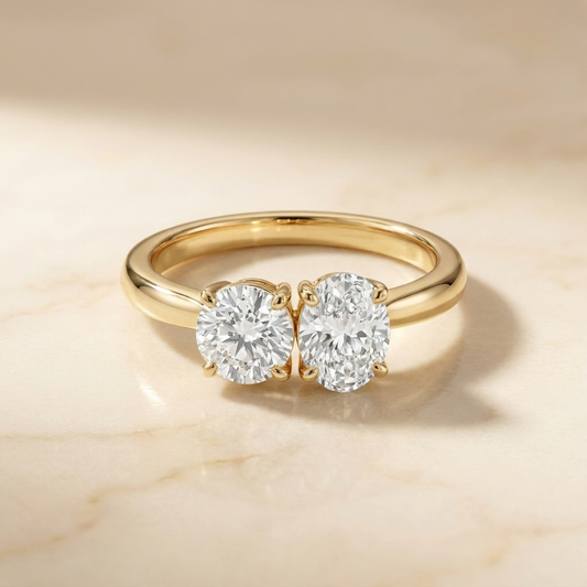 14K Yellow Gold Jackie Select Toi et Moi Round & Oval Knife Edge Band Lab Diamond Engagement Ring - Hero on warm marble