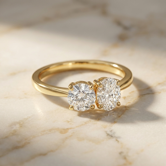 18K Yellow Gold Jackie Select Toi et Moi Round & Oval Knife Edge Band Lab Diamond Engagement Ring - Hero on warm marble