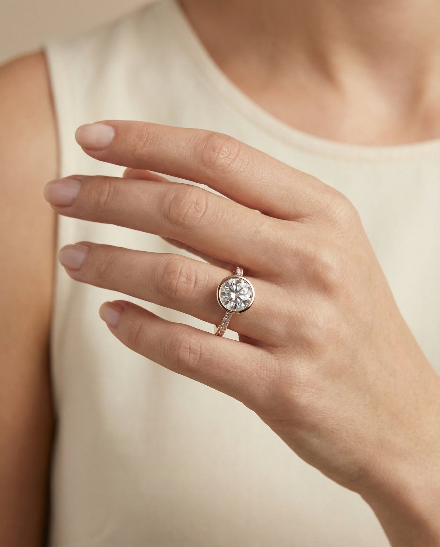 Round Brilliant, Linear Bezel Pavé, in 14K Rose Gold – lifestyle shot | RockHer