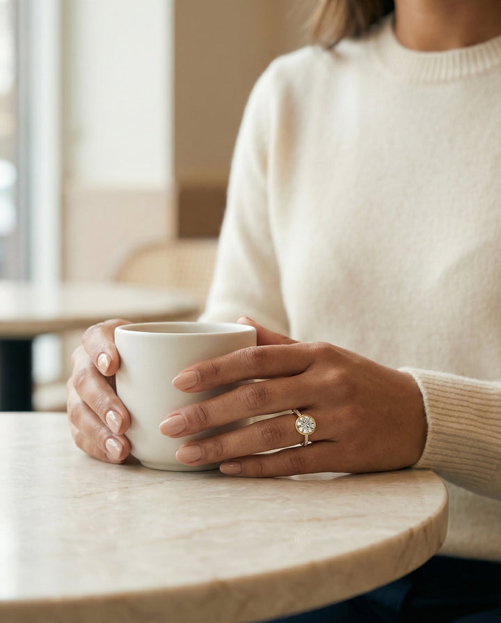 Round Brilliant, Linear Bezel Pavé, in 18K Yellow Gold – lifestyle shot | RockHer