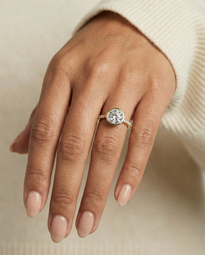 Round Brilliant, Linear Bezel Pavé, in 18K Yellow Gold – lifestyle shot | RockHer