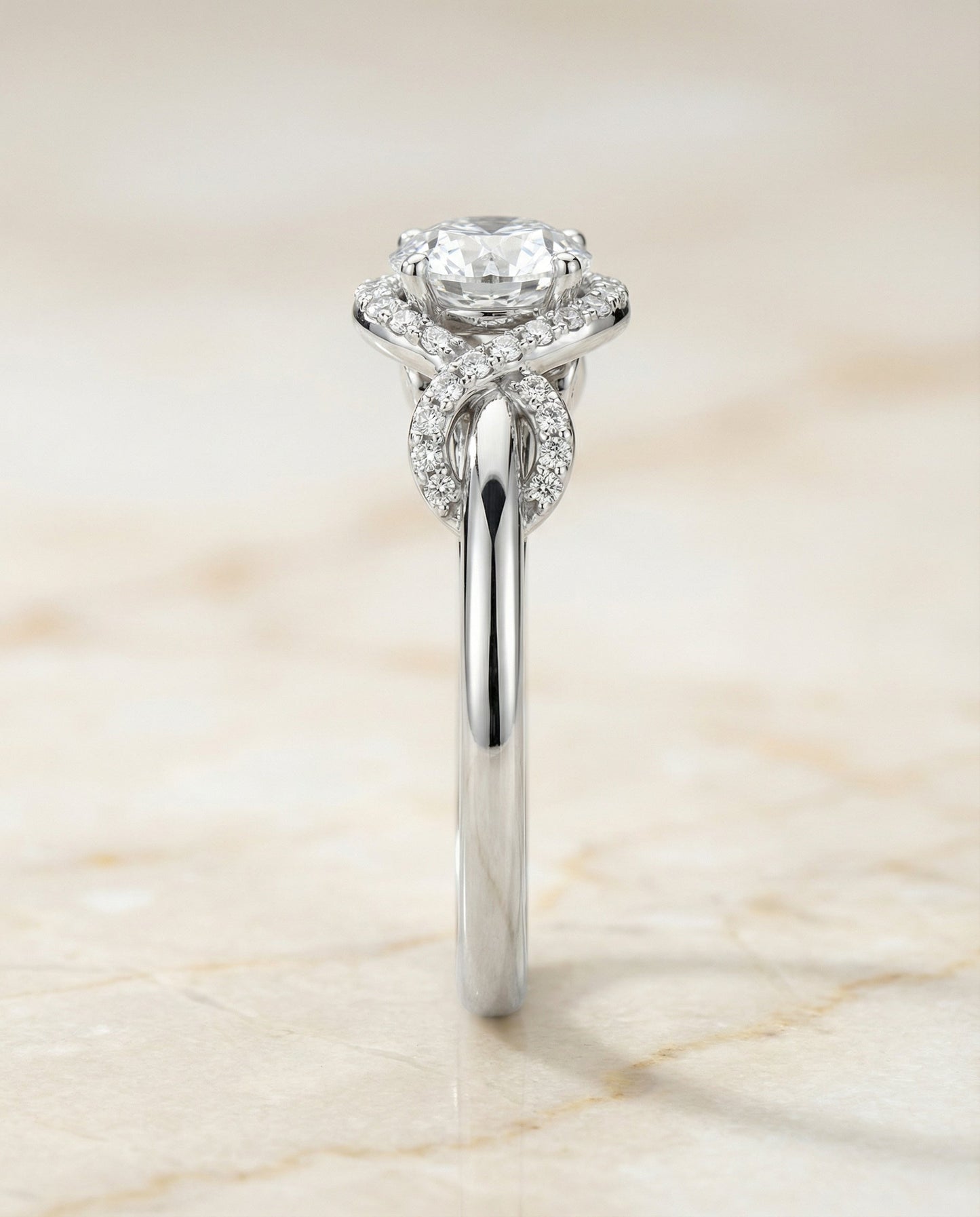 Round Brilliant, Love Knot Halo, in Platinum, pave setting – side profile | RockHer