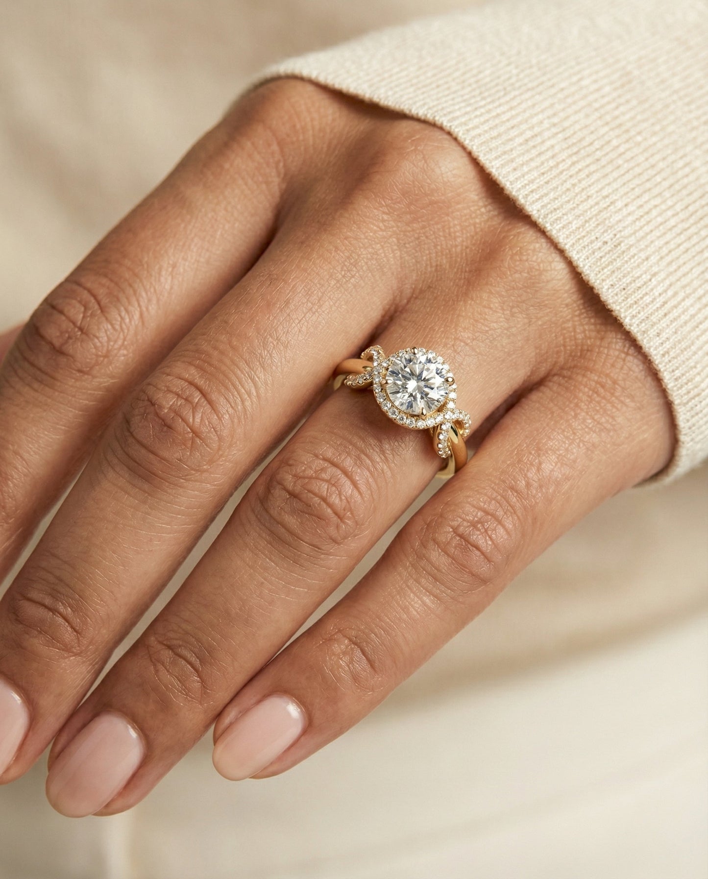 Round Brilliant, Love Knot Halo, in 18K Yellow Gold, pave setting – lifestyle shot | RockHer