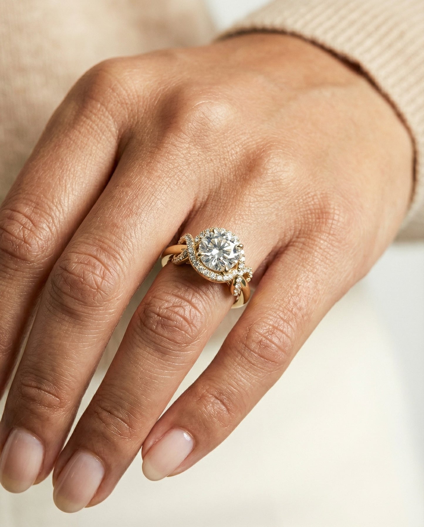 Round Brilliant, Love Knot Halo, in 18K Yellow Gold, pave setting – lifestyle shot | RockHer