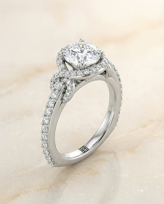 Round Brilliant, Love Knot Pavé Halo, in Platinum, pave setting – angled view | RockHer